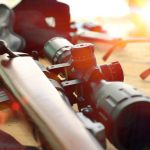 Close,Up,Of,Rifle,Telescope,For,Sport,Hunting,On,Table